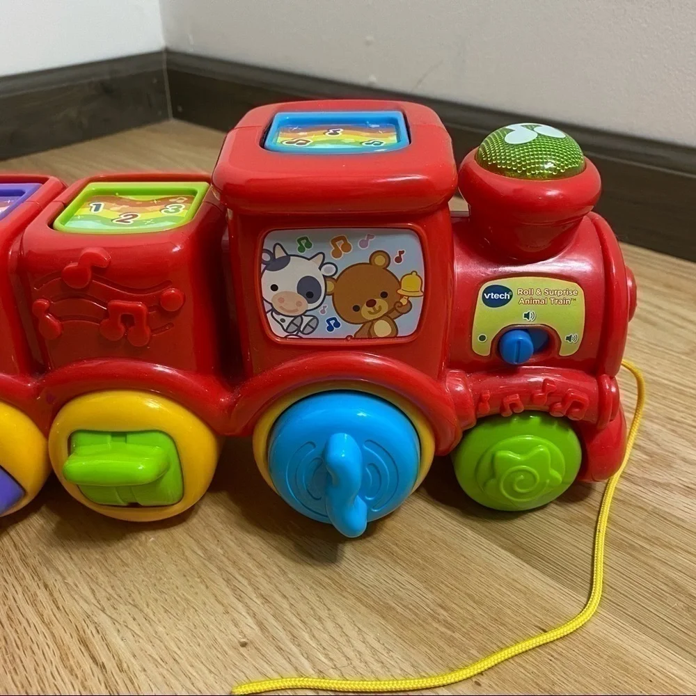 V-tech Roll & Surprise Animal Train Pop Up Music